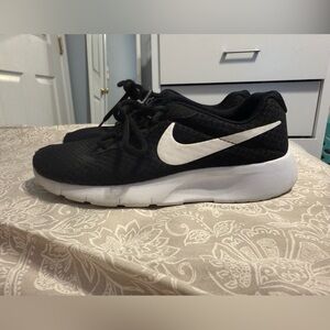 Nike Kids Black Sneakers with White Swoosh